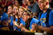 Team 1507 membes (from left) Kate Matties, Emma Binner, Jenna Le, and Oscar Handley from Lockport High School in Lockport, N.Y. cheer on their teammates at the FIRST Robotics Pittsburgh Regional competition.